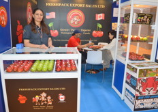 Freshpack apple growers and exporters in US and Canada, Harinderjit Chauhan wife of owner, Kam Chauhan who is in a meeting with a client in the back.